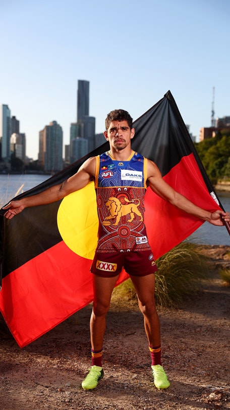 cameronSDNR350.jpg Charlie Cameron models the Lions' indigenous jumper for 2018. Picture: Brisbane Lions - AFL,Brisbane Lions,Charlie Cameron,Allen Christensen